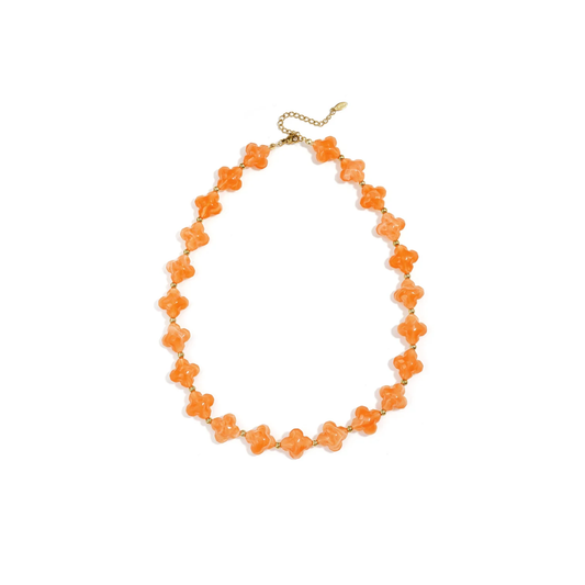 Oranje klaver kralenketting met marble kralen en gouden accenten