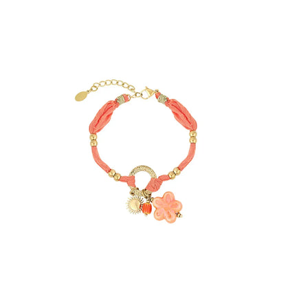 Setje oranje stof armband en ketting goud bloem zon en kraaltje - Casa Jadel