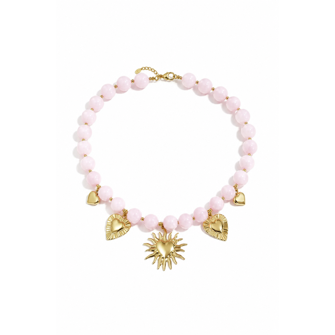 Roze marble kralenketting met gouden hartjesbedels van Casa Jadel
