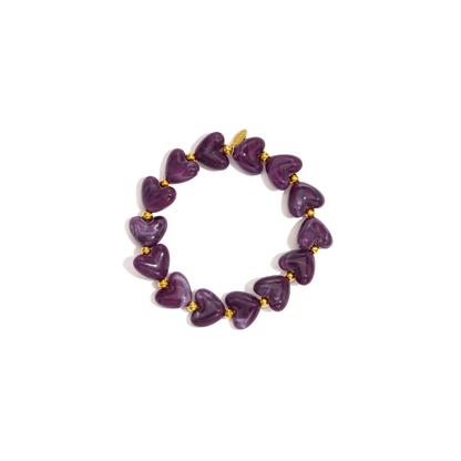 Paars marble hartjes kralenarmband Lieve met paarse en lila gemarmerde hartjes en gouden details