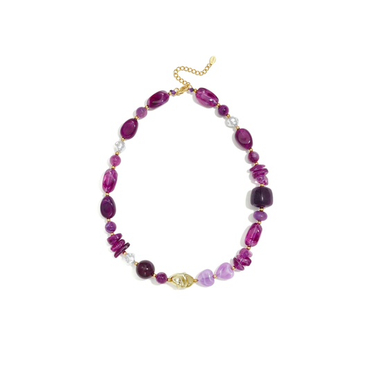 Paarse-lila mixed chunky kralenketting met verschillende kralen en gouden details
