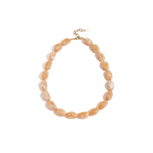 Perzik chunky statement kralenketting met grote marble kralen en gouden details