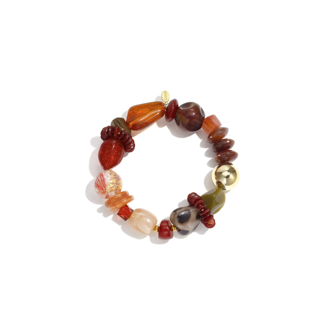Bruine oranje burgundy chunky kralenarmband met gekleurde kralen en gouden details
