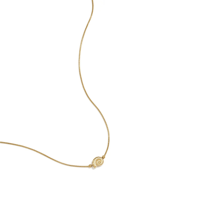 Gouden ketting met spiraalschelpje