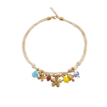 Naturel rope ketting met gouden en glazen bedels
