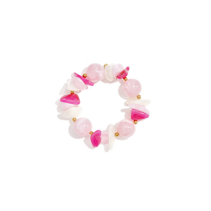 Roze chunky kralenarmband met fuchsia marble kralen en goudkleurige details van Casa Jadel.