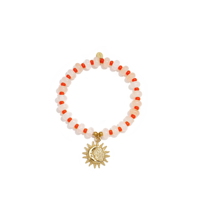 Babyroze glazen kralenarmband met zon- en maan bedel