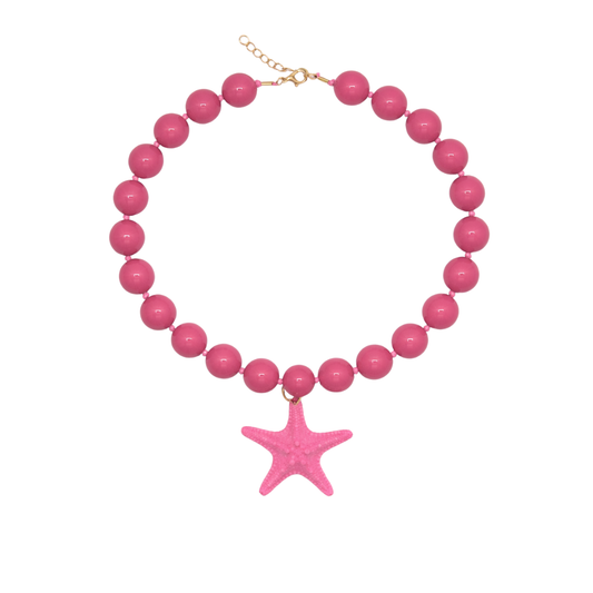 Roze kralenketting met grote ronde kralen en zeesterhanger