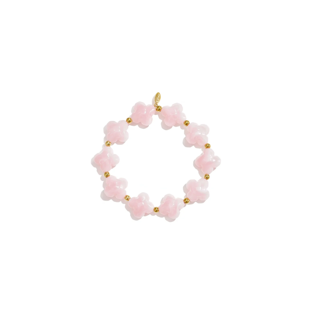 Roze klaver armband met transparante kralen en gouden details van Casa Jadel