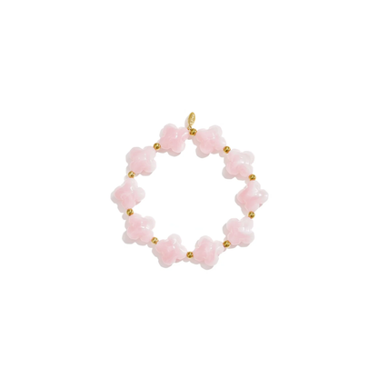 Roze klaver armband met transparante kralen en gouden details van Casa Jadel