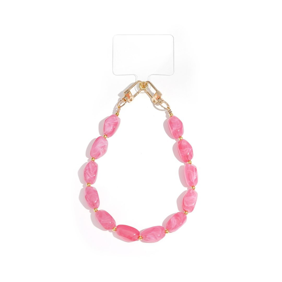 Roze kralen telefoonkoord met goudkleurige clips en ovale kralen.