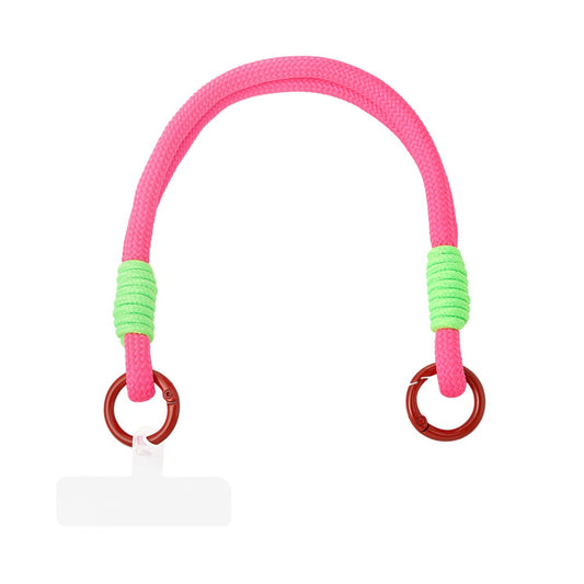 Telefoon dubbel koord in neonroze met neongroene accenten en transparante telefoonadapter.