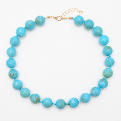 Turquoise gemarmerde grote kralenketting