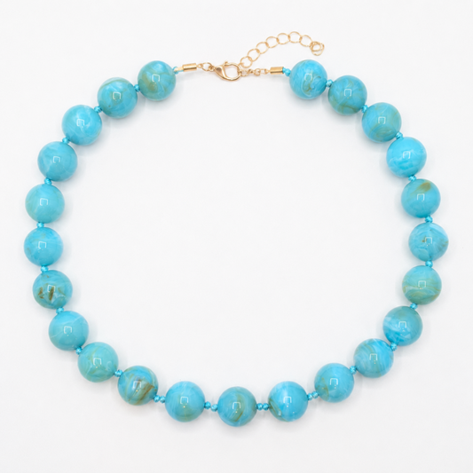 Turquoise gemarmerde grote kralenketting met marble effect kralen