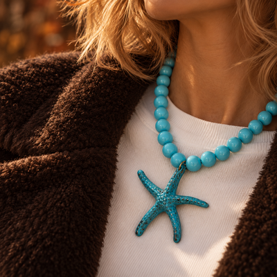 Turquoise kralenketting Iris met oversized zeester bedel