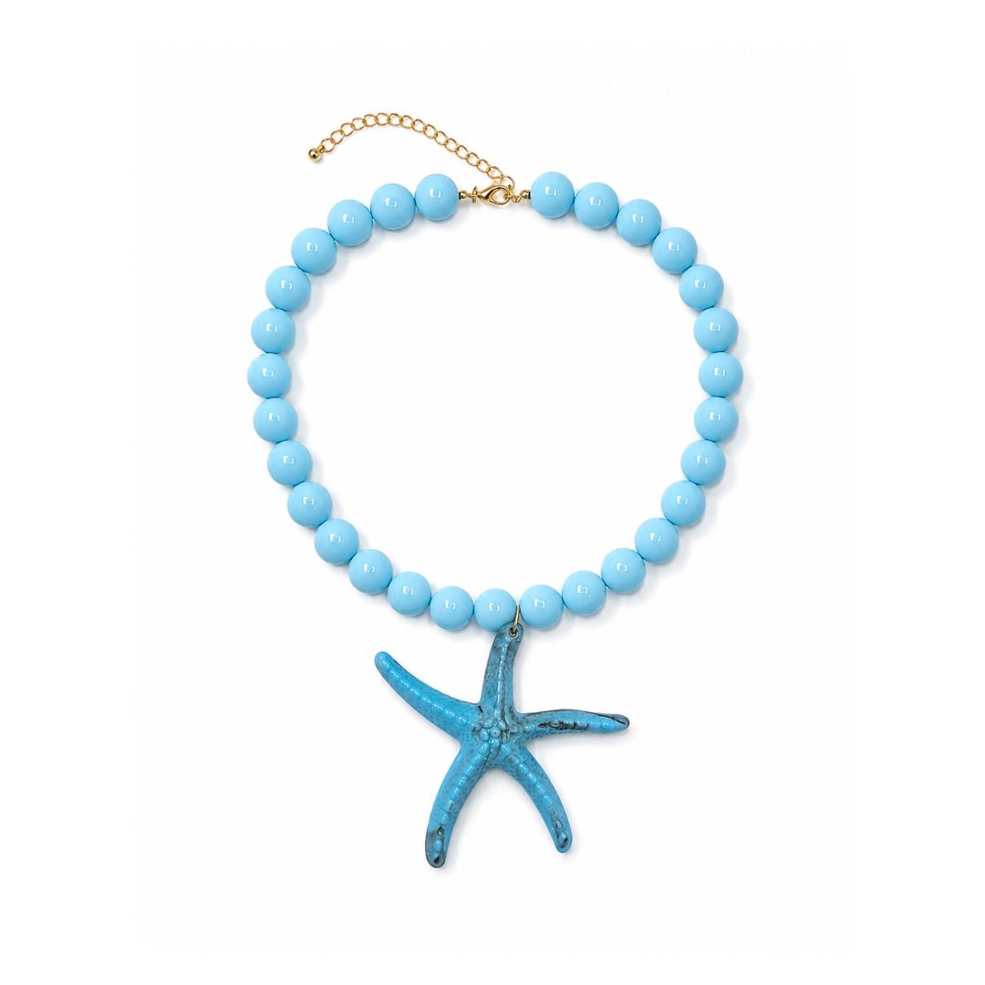 Turquoise kralenketting Iris met 13,5 mm marble kralen en een oversized zeester bedel van 9 cm.