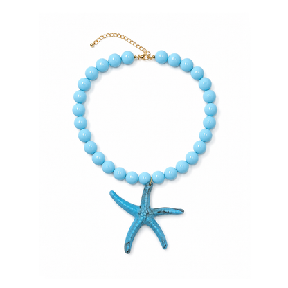 Turquoise kralenketting Iris met 13,5 mm marble kralen en een oversized zeester bedel van 9 cm.