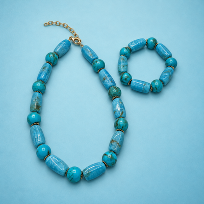 Turquoise long & round marble kralenset