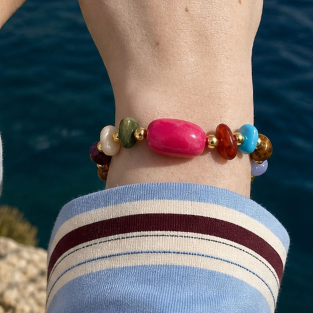 Veelkleurige marble splitkralen armband met roze kraal close-up | Casa Jadel