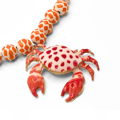 Wit oranje kralenketting met krab bedel statement dames ketting zomer sieraden Casa Jadel
