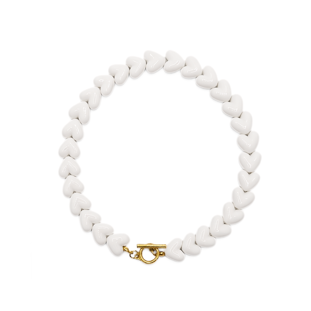 Witte hartjes kralenketting met gouden frontsluiting Ibiza style dames ketting Casa Jadel