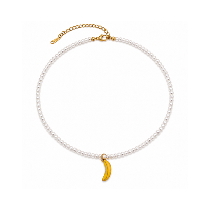 Witte parel kralenketting met gele banaan bedel en goudkleurige stainless steel sluiting van Casa Jadel.