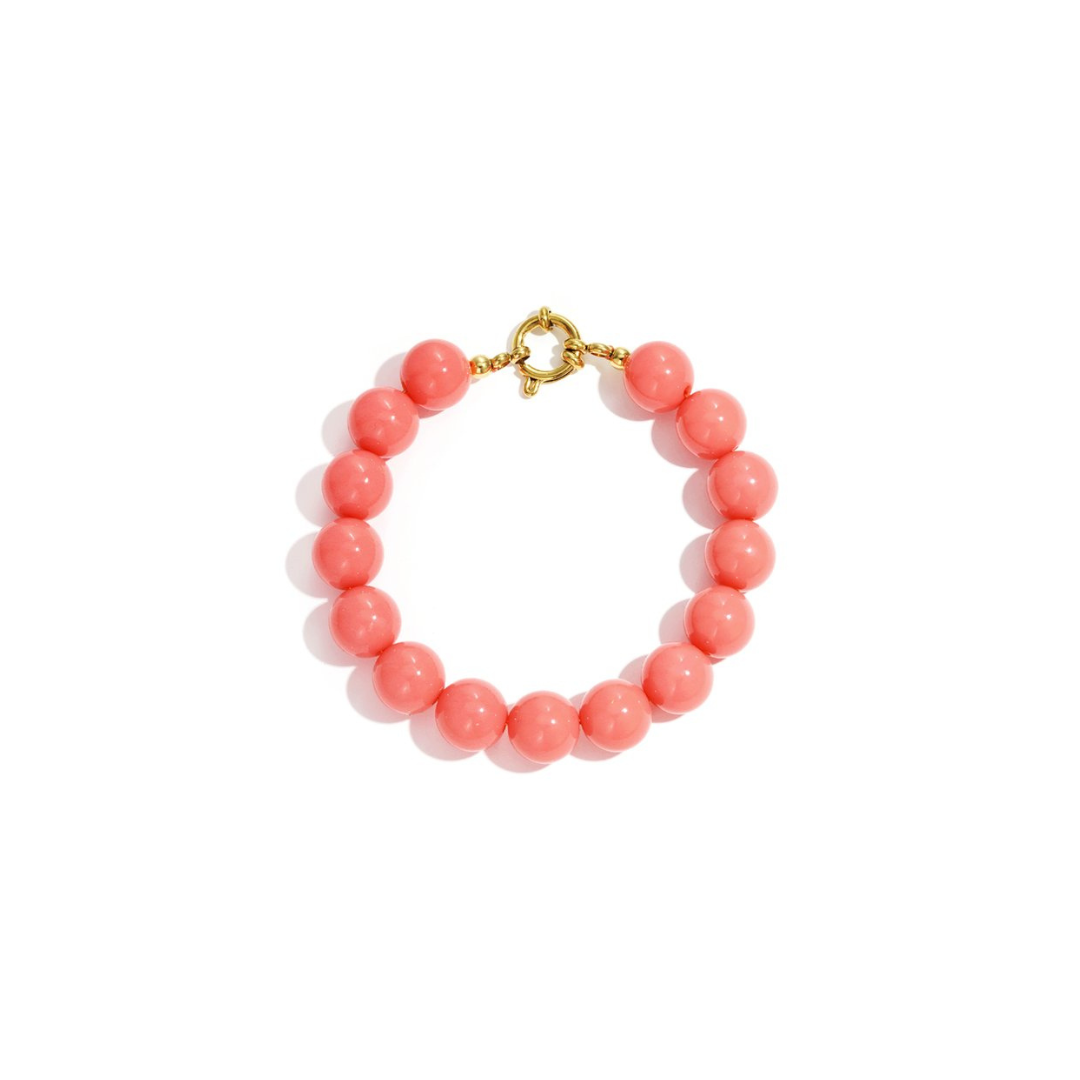 Zalmroze kralenarmband met goudkleurig boeislot in Ibiza style