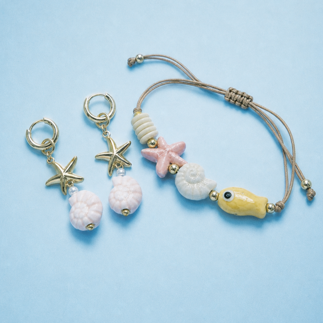 Zeedieren set met oorbellen en armband met schelp zeester en vis bedels van Casa Jadel