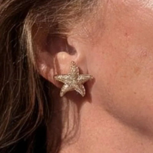 Goudkleurige zeester oorknopjes