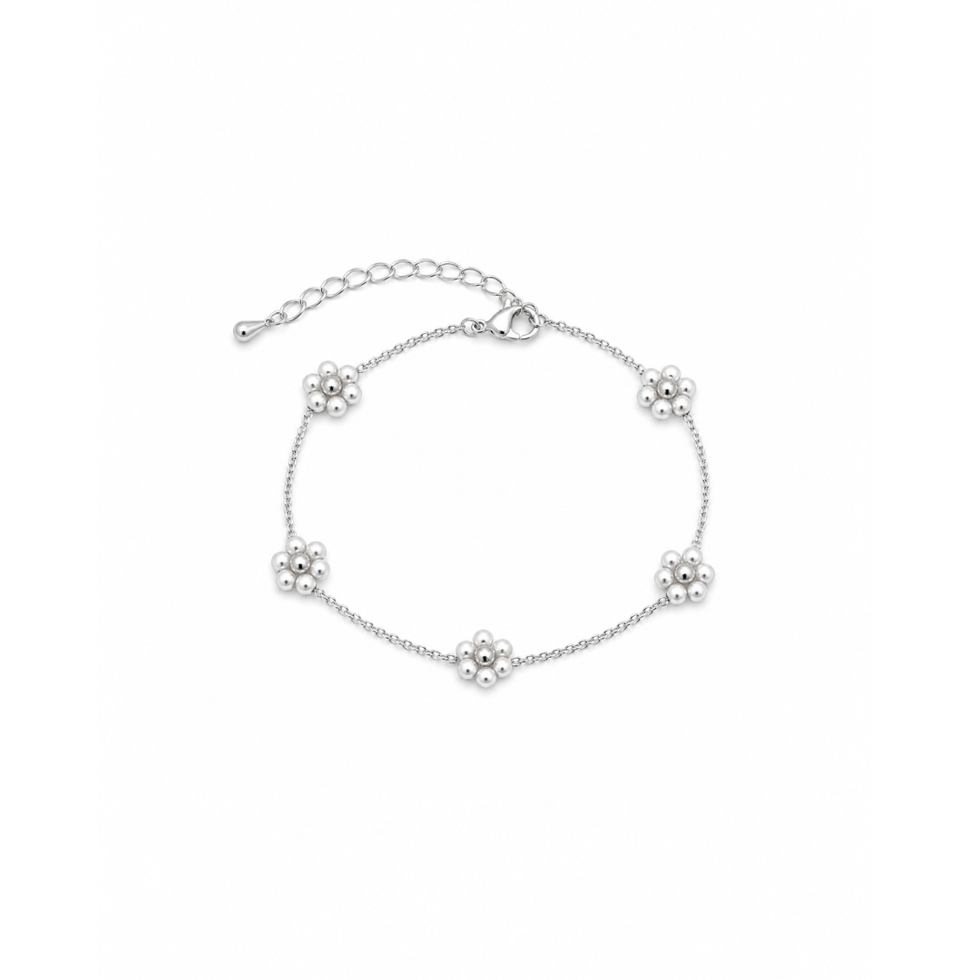 Zilveren schakelarmband met bloemen van parels en verstelbare sluiting van Casa Jadel.