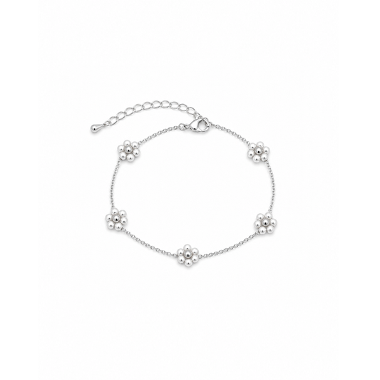Zilveren schakelarmband met bloemen van parels en verstelbare sluiting van Casa Jadel.