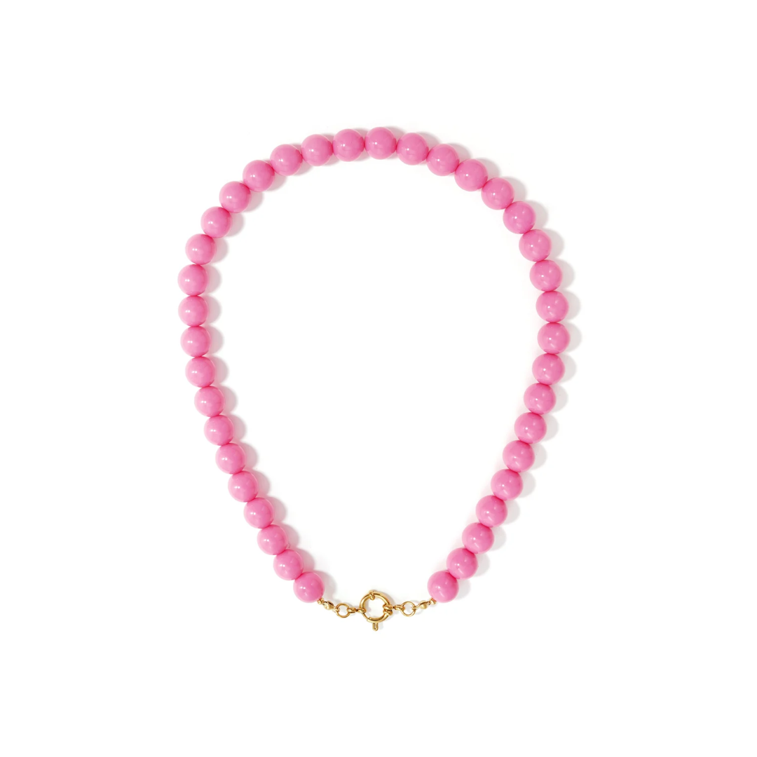Zuurstokroze kralenketting met ronde kralen en gouden boeislot dames
