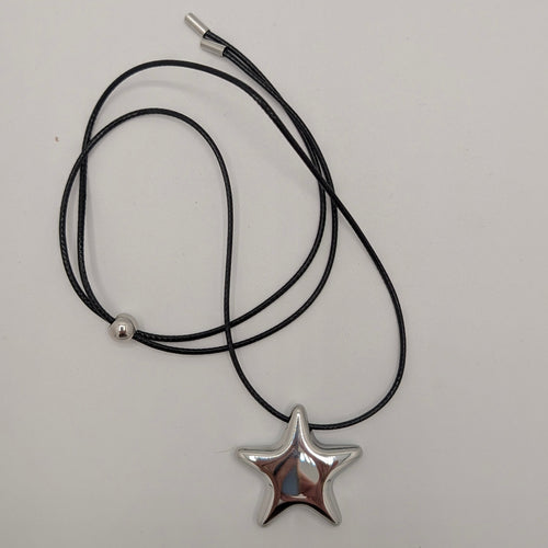Zwart koord ketting met zilveren ster